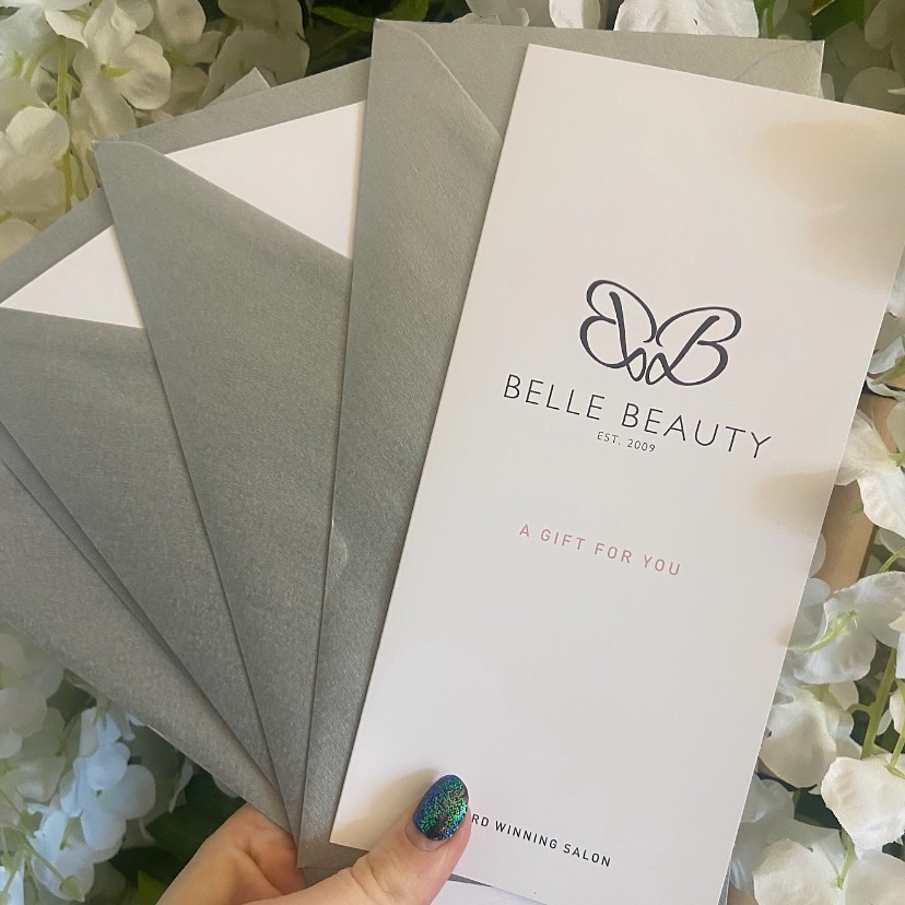 Belle Beauty gift vouchers being held in our Malvern salon